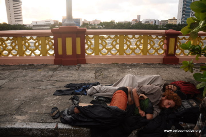 Nicola Zolin and Benjamin Lesage sleeping on the sidewalk in Recife, Brazil.