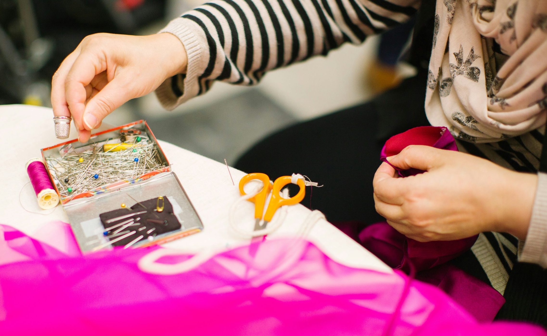 picture of someone sewing