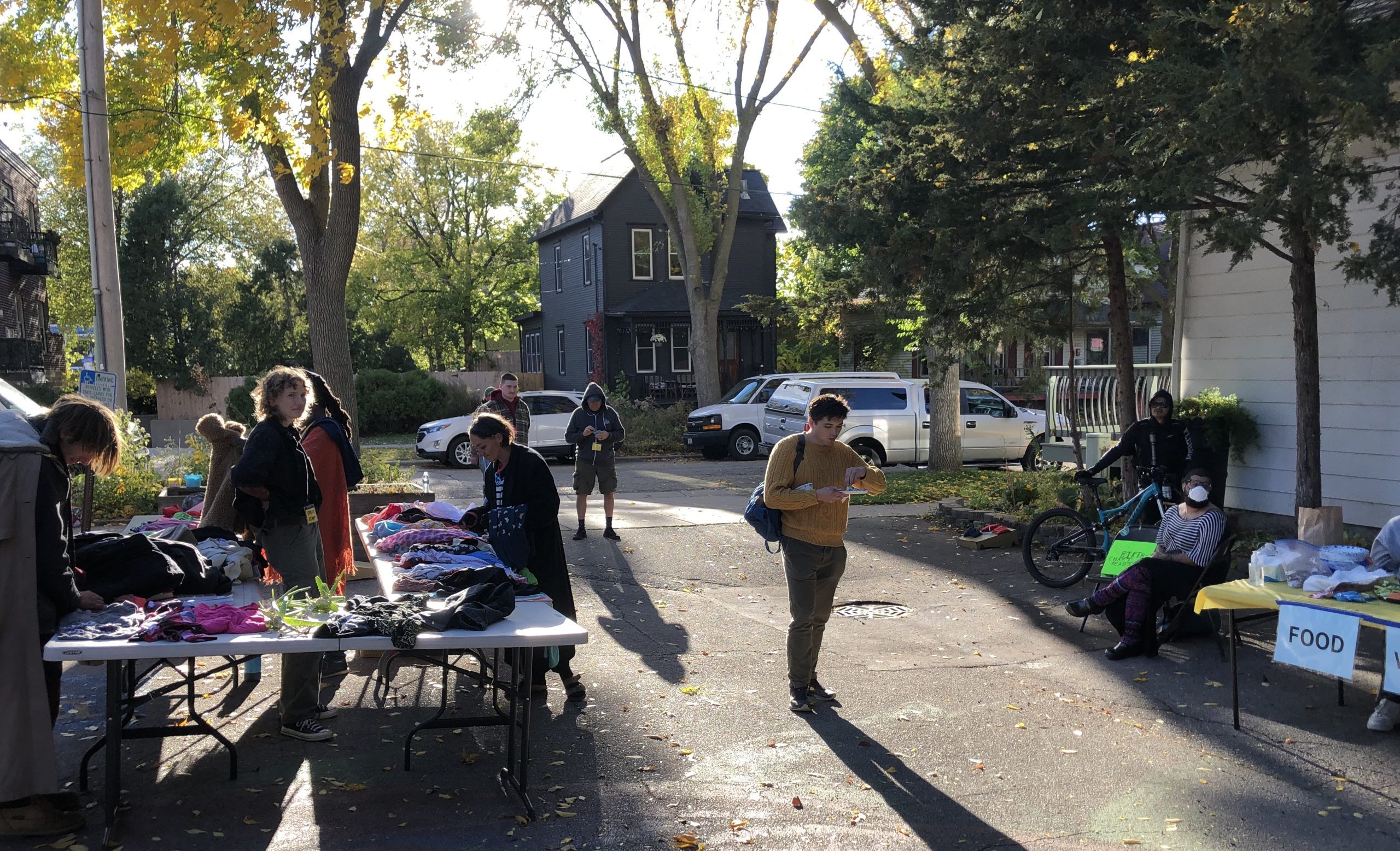 People outside on a beautiful sunny day sharing